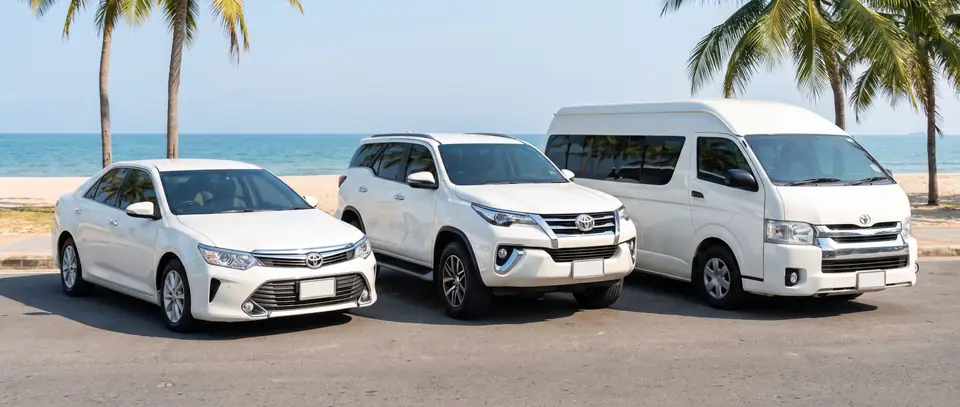 Sedan, SUV and van parked on the Hua Hin seafront